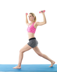 Sporty girl holding weights. Fitness gym concept.