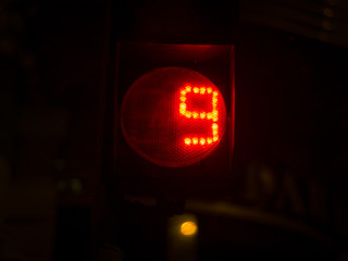 Street light numbers in the night. Low light photo.