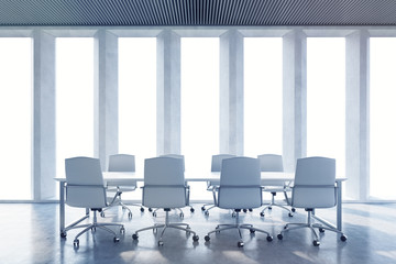 Conference room with wide shades on the window