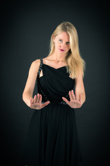 Fototapeta premium Beautiful woman doing different expressions in different sets of clothes: stop sign