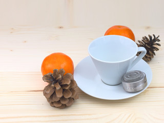 White tea cup on wood background
