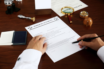 Notary public signing power of attorney in office