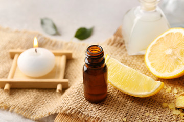 Beautiful spa composition with lemon essential oil, closeup