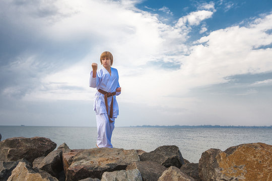 Young boy training karate