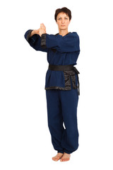 Fototapeta premium Beautiful woman doing different expressions in different sets of clothes: fighting