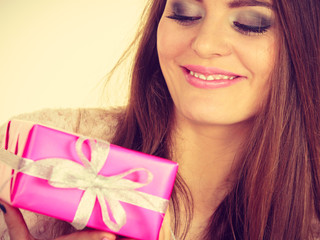 Lovely woman with pink rose box gift