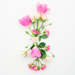 Fototapeta premium Pattern with flowers, branches and leaves isolated on white background. Flat lay, Top view.