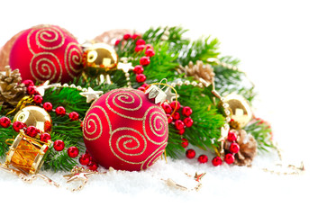 Red Christmas and New Year decorations over white background. Christmas tree