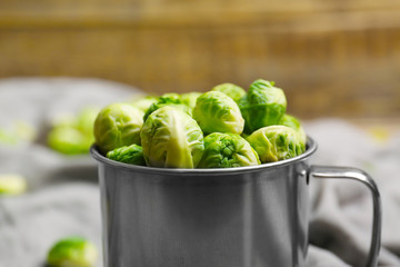 Brussels sprouts in metal mug, closeup