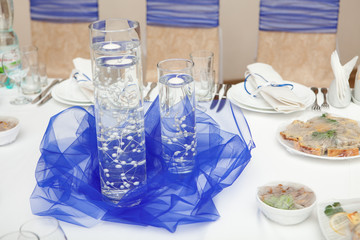 transparent vases on wedding table