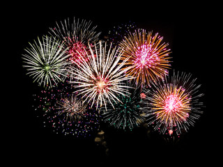 colorful fireworks over dark sky abstract for background. New Year celebration fireworks.