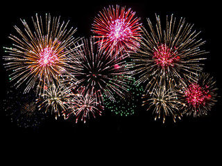 colorful fireworks over dark sky abstract for background. New Year celebration fireworks.