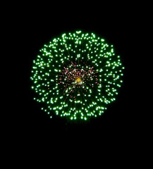 Brightly Colorful Fireworks isolated black background. New Year celebration fireworks.