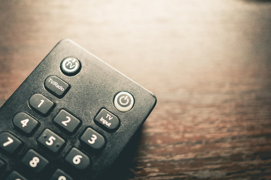 Old TV Remote With Number Pad And On Off Buttons.