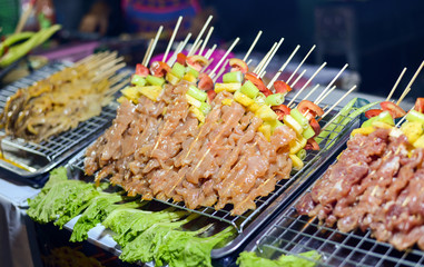 Bar-B-Q or BBQ with kebab cooking. chicken, street food in Thailand