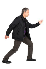 Handsome man doing different expressions in different sets of clothes: miming running