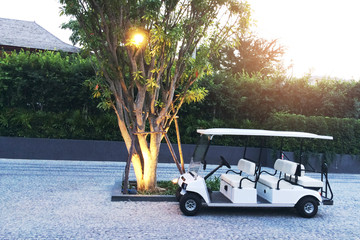 Resort Golf Car waiting for passenger.