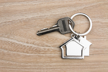 House-shaped key in the wood