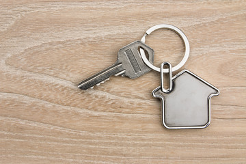 House-shaped key in the wood