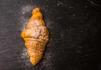 Breakfast concept with croissant