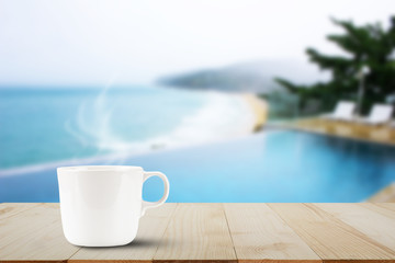 Man's hand holding mobile phone on blurred city light at night, communication technology concept