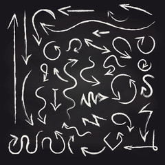 Chalk arrows set on blackboard background vector illustration