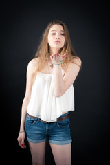 Beautiful woman doing different expressions in different sets of clothes: kiss