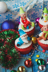 Christmas cupcakes with colored decorations