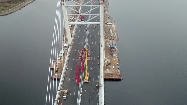 Aerial top view of modern multi lane cable-stayed bridge at the day time