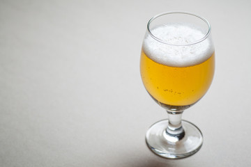 Light beer on gray