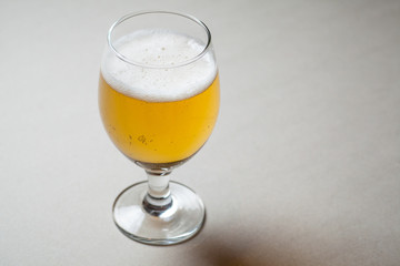 Light beer on gray