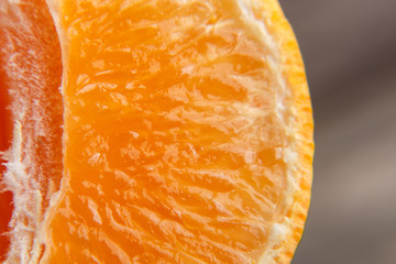 Macro texture of sliced mandarin/citrus close up
