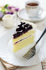 blueberry cake and cup of tea