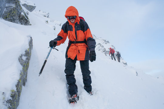 Mountaineering. Teamwork in alpinism.  Traverse of mountain.