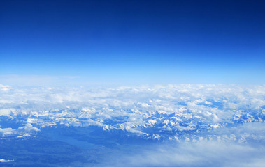 Fototapeta na wymiar Swss Alps covered in snow - an aerial view from plane