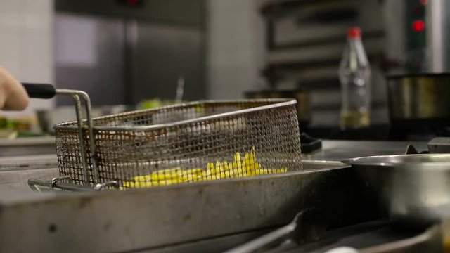 French fries in fryer chipser