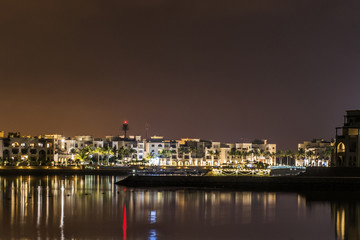 Fototapeta na wymiar Amazing night lights Sultanate Oman Souly Bay harbour and Hotels Oceanside 6