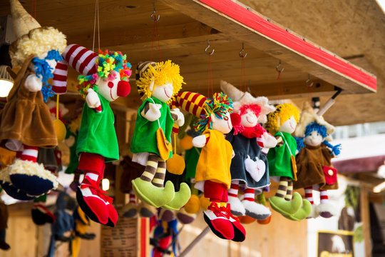assortment of handicraft puppets