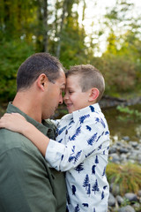 Fototapeta premium Young Boy With Father