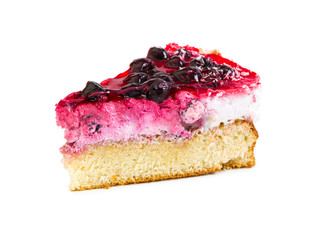 Piece of cake with souffle and black currant, covered with jelly