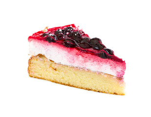 Piece of cake with souffle and black currant, covered with jelly