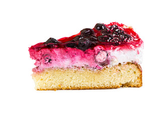 Piece of cake with souffle and black currant, covered with jelly