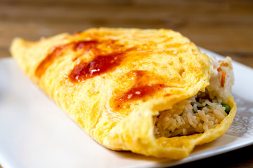Japanese cuisine - omelet rice warpped on a plate