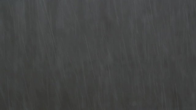 Heavy rain against grey backdrop