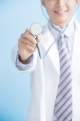 male doctor show stethoscope