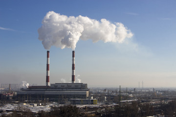 the smoke from the pipe of the plant, the emission  harmful gases into the atmosphere, greenhouse efekt