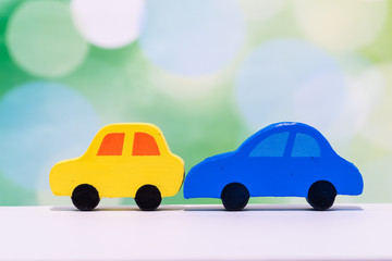 Auto Concept.  Toy Car on Green Background