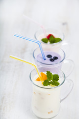 Smoothies or yogurt with fresh berries. Milkshakes with raspberr