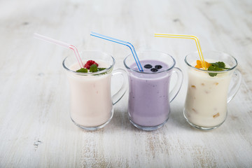 Smoothies or yogurt with fresh berries. Milkshakes with raspberr