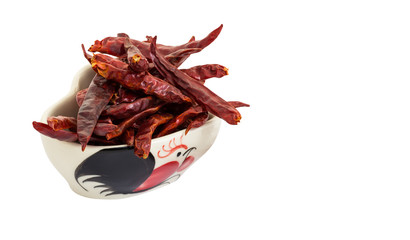 Dry chili in the cup on white background and clipping path